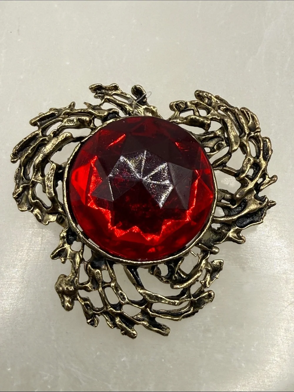Faceted Antique-Style Red Stone Brooch in Aged Gold Tone metal brutalist dome
